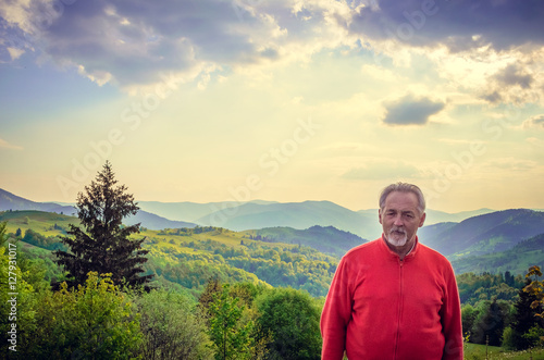 Senior man and beautiful landscape