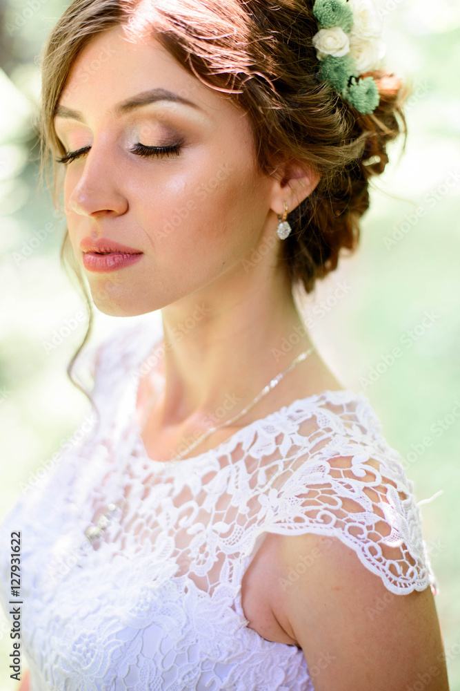 nice portrait of young and beautiful bride in a white dress nice portrait of young and beautiful bride in a white dress