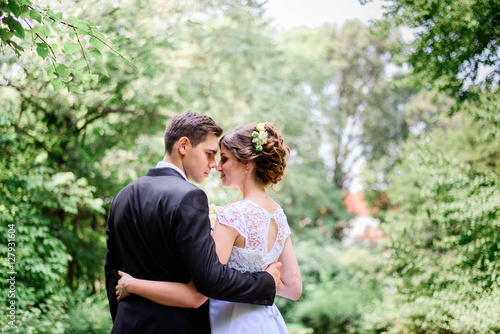 nice portrait of young and beautiful bride and groom