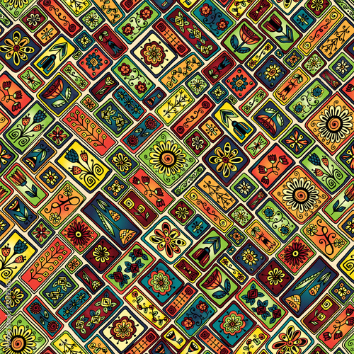 Seamless patchwork pattern from moroccan tiles and abstract flowers.