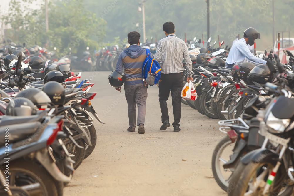 Fototapeta premium many motorcycles parked on India Delhi airport