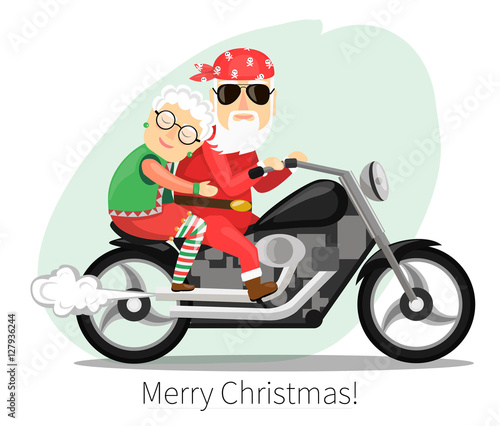 Santa Claus and Mrs.  riding on a steep motorcycle