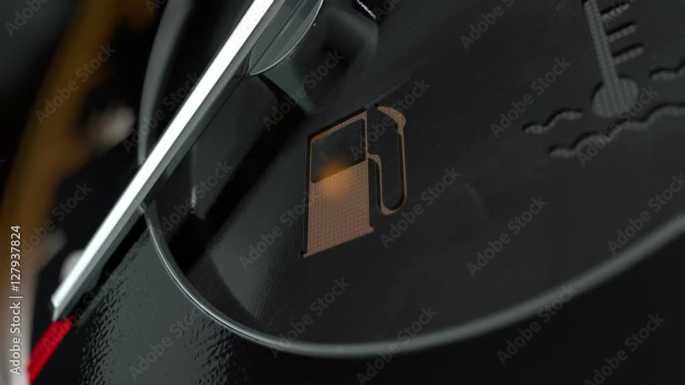 A 3D render of an extreme closeup of a blinking low petrol fuel