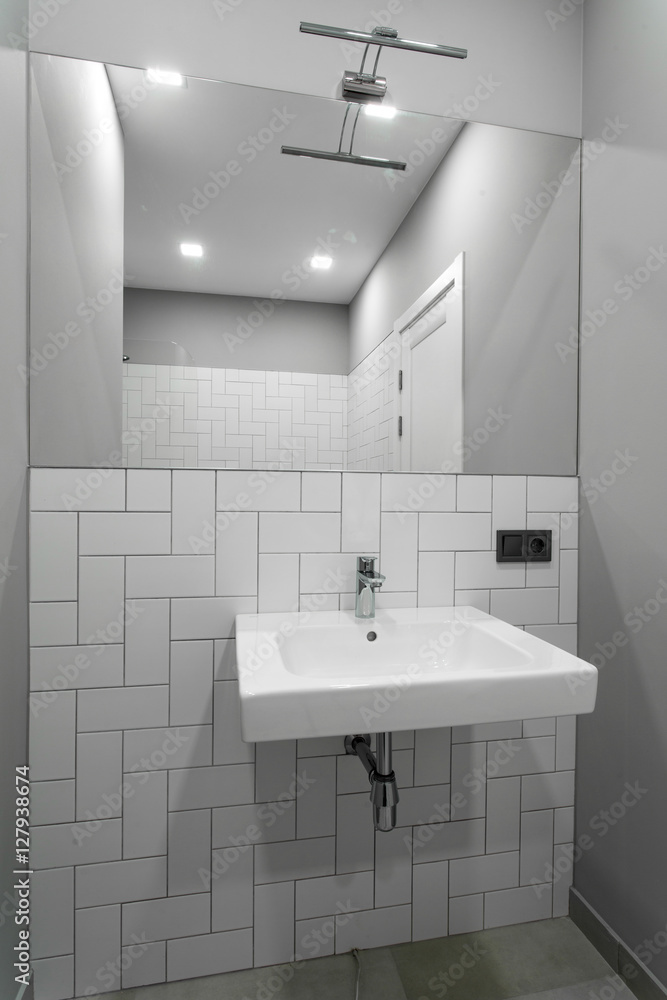 Fototapeta premium bathroom interior with a wash basin, sink and mirror