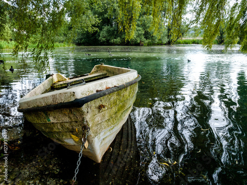 Barca nel lago di Posta Fibreno in ciociaria photo