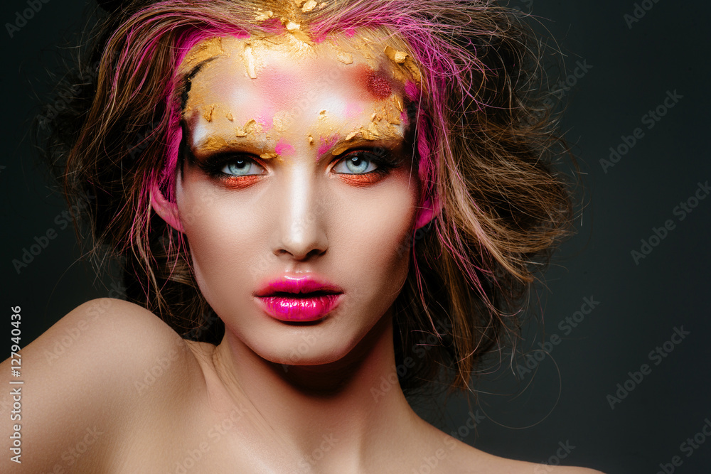 High fashion look.glamor closeup portrait of beautiful sexy stylish blond young woman model with bright makeup and pink lips with perfect clean skin. image of the Queen. advertising space High fashion look.glamor closeup portrait of beautiful sexy stylish blond young woman model with bright makeup and pink lips with perfect clean skin. image of the Queen. advertising space