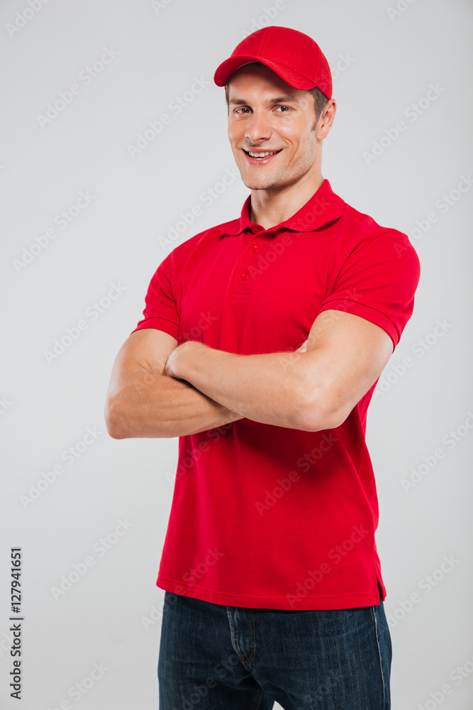 Image of deliveryman with arms crossed Image of deliveryman with arms crossed