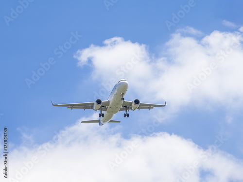 Airplane flying under blue sky 3