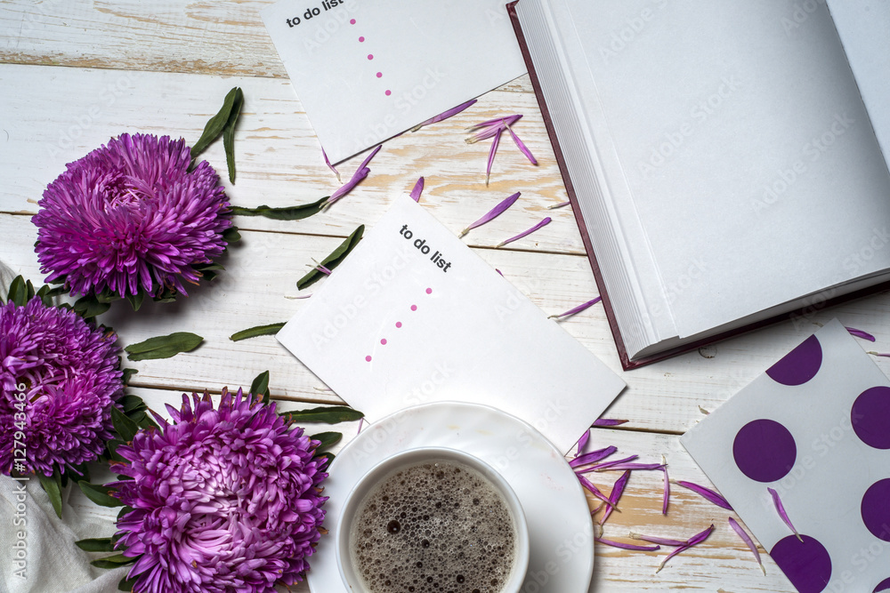 Word relax with cup of coffee and pink flowers