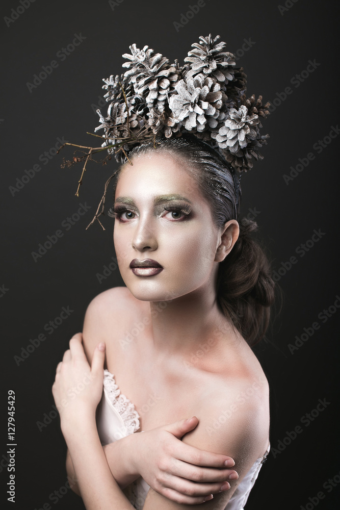 Elegant Girl in the New Year Wreath of Pine Cones Elegant Girl in the New Year Wreath of Pine Cones