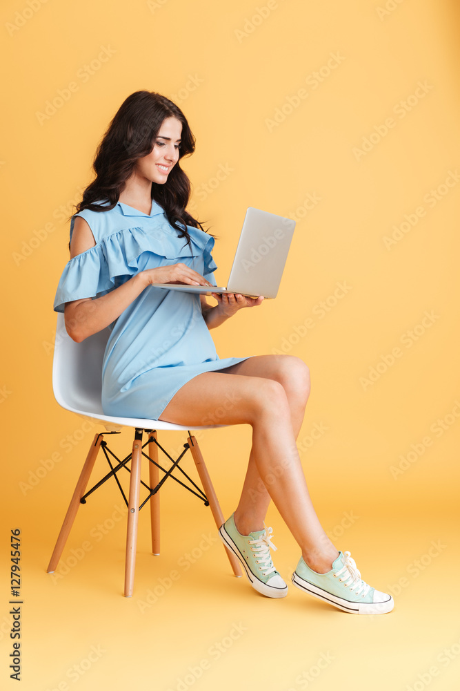 Smart beautiful young girl using laptop pc computer Smart beautiful young girl using laptop pc computer