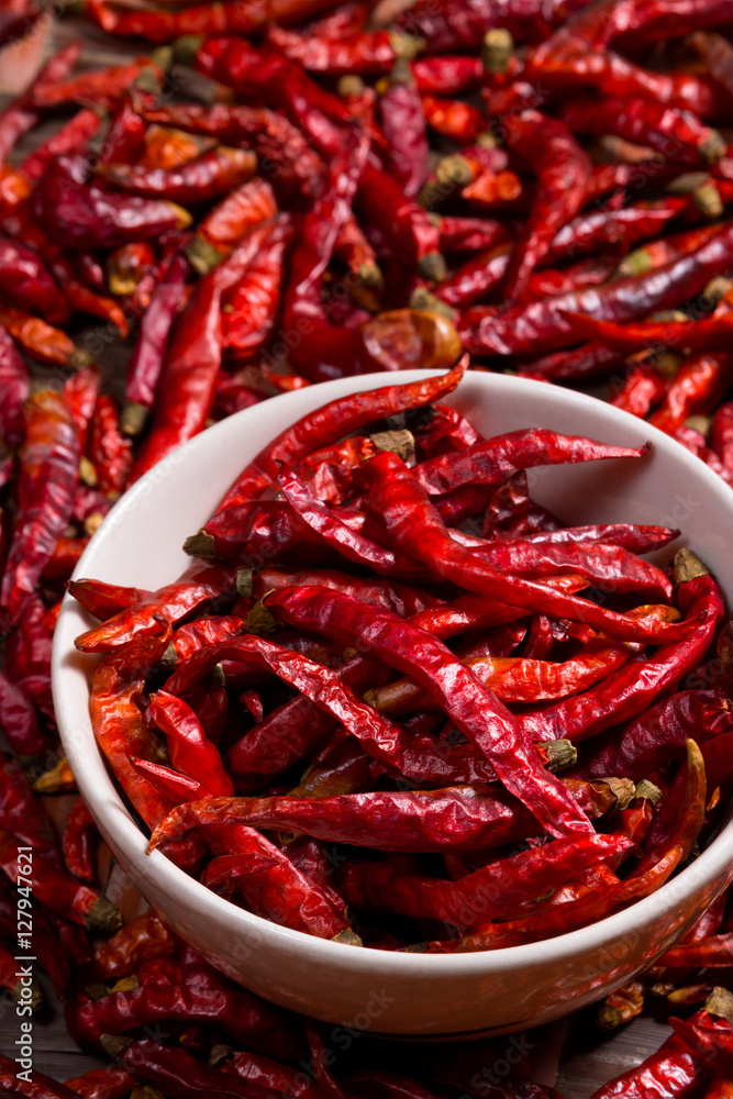 Red hot chili pepper dried in white cup Red hot chili pepper dried in white cup