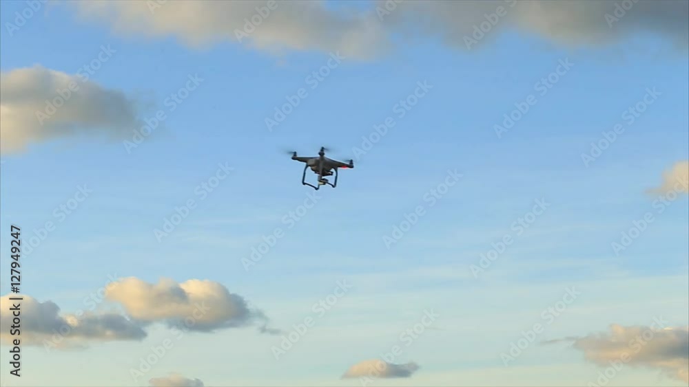 This video is about Drone flying on the blue sky background. This video is about Drone flying on the blue sky background.