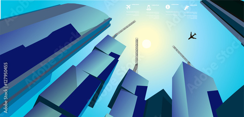 sky scrappers and crane under construction