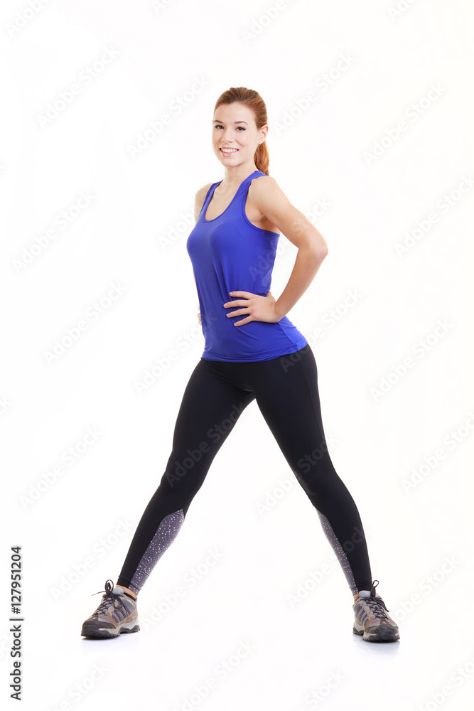 fit woman with her hands on hips
