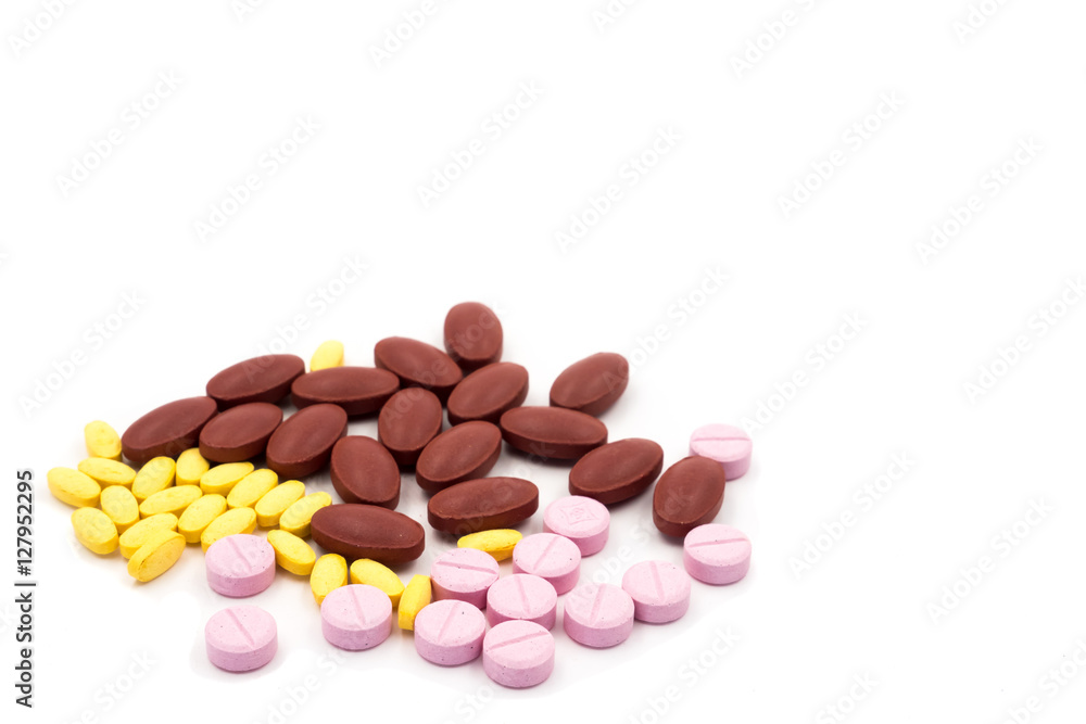 Lot of different medicine pills on white background. Lot of different medicine pills on white background.