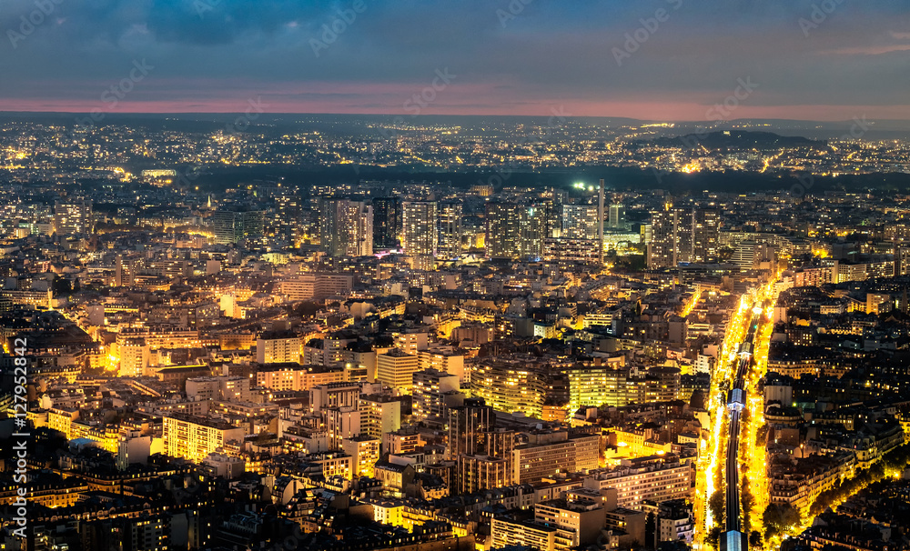 Aerial view of Paris, France at night.
