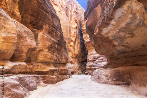 The road between the red cliffs to the ancient city of Petra, Jordan