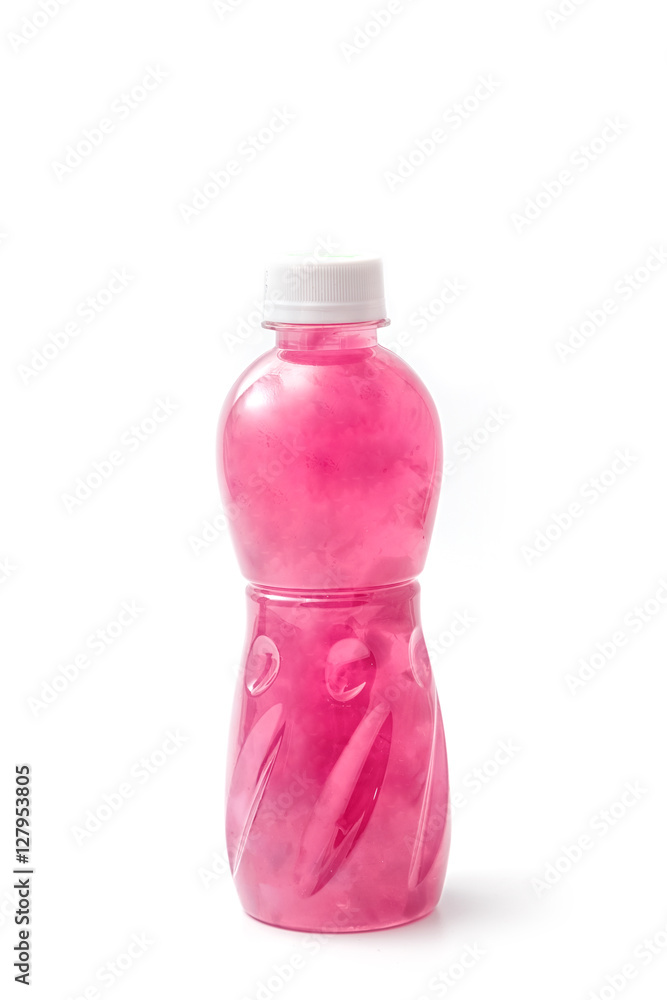 Bottles of pomegranate juice isolated on white background Bottles of pomegranate juice isolated on white background