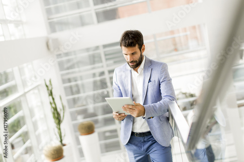 Young businessman with tablet