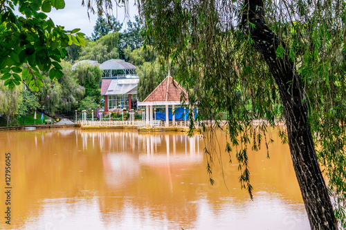 Obraz na płótnie Pond with round pavilion on a water at a park of flowers at Vietnam w salonie