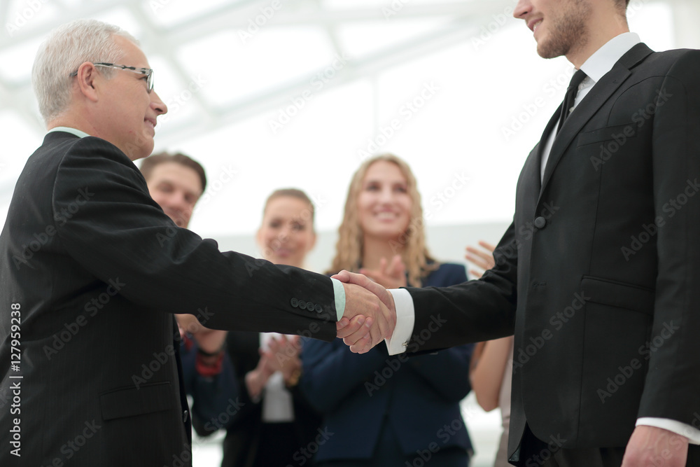 Handshake between competitors before the start of business negot Handshake between competitors before the start of business negot
