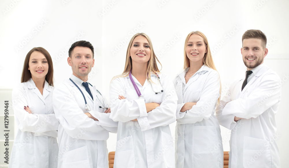 Portrait of group of smiling hospital colleagues standing togeth Portrait of group of smiling hospital colleagues standing togeth