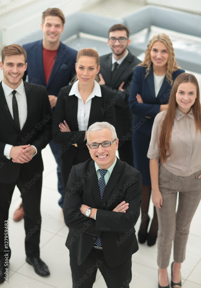 Group portrait of a professional business team looking confident Group portrait of a professional business team looking confident