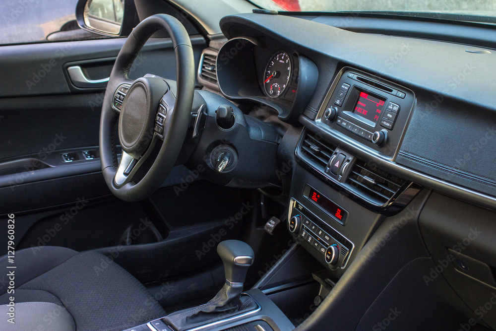 Modern car interior with smart phone