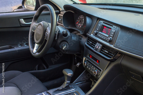 Modern car interior with smart phone