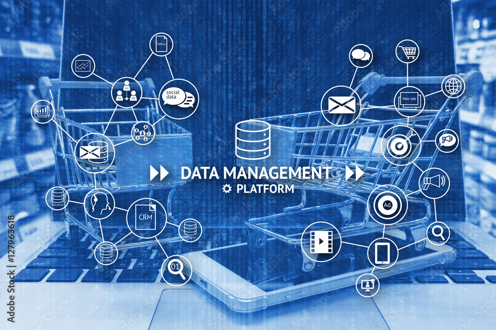 Obraz premium Data Management Platform (DMP) , Marketing and crm concept. Infographic ,texts and icons with two shopping carts on smart phone and laptop in retail shop , supermarket or hypermart abstract background