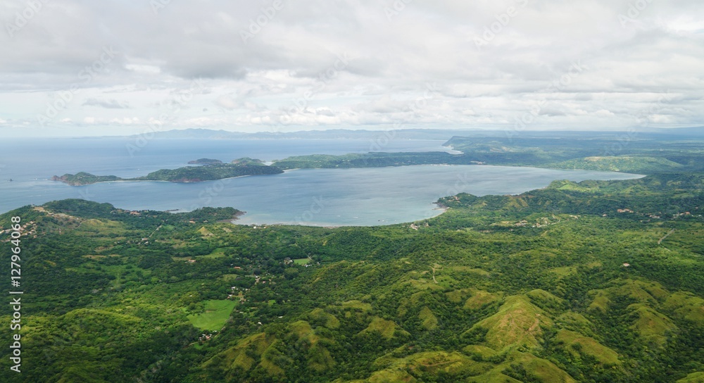 Aerial view in the clouds of rhe Golfo del Papagayo with the Peninsula Papagayo near Liberia, Costa Rica