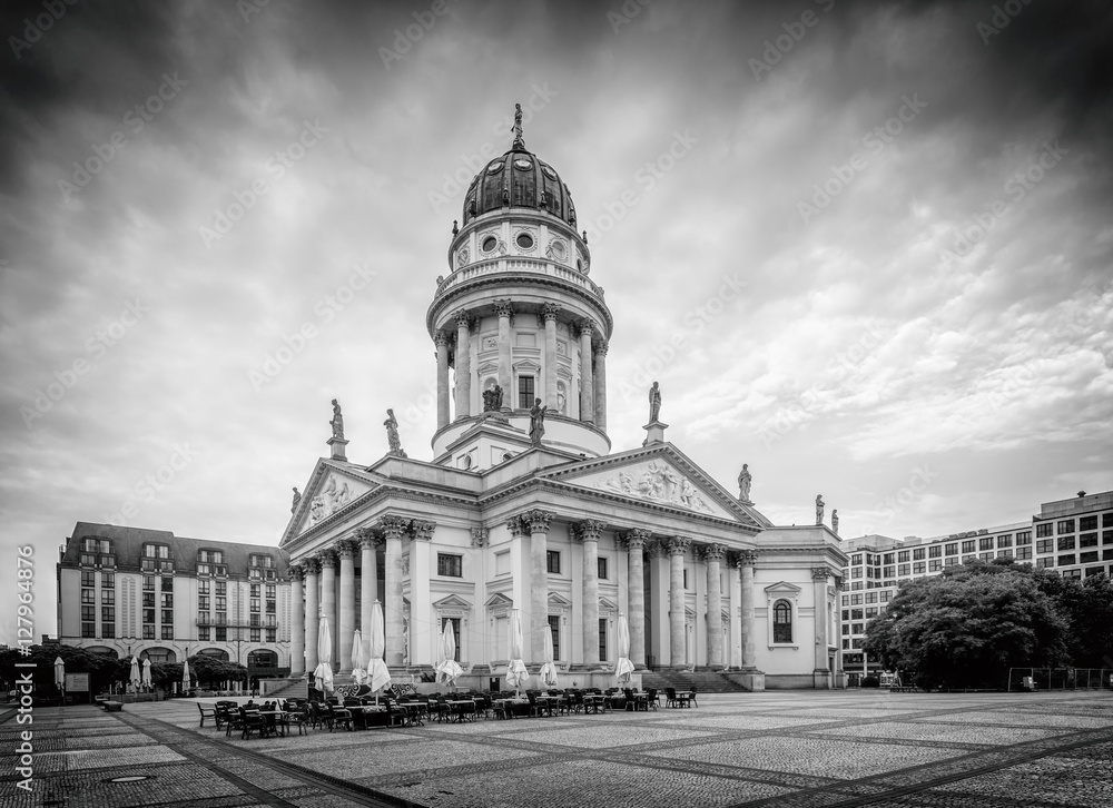 View on German Cathedral and trees on Gendarmenmarkt in Berlin, Germany, Europe, black and white