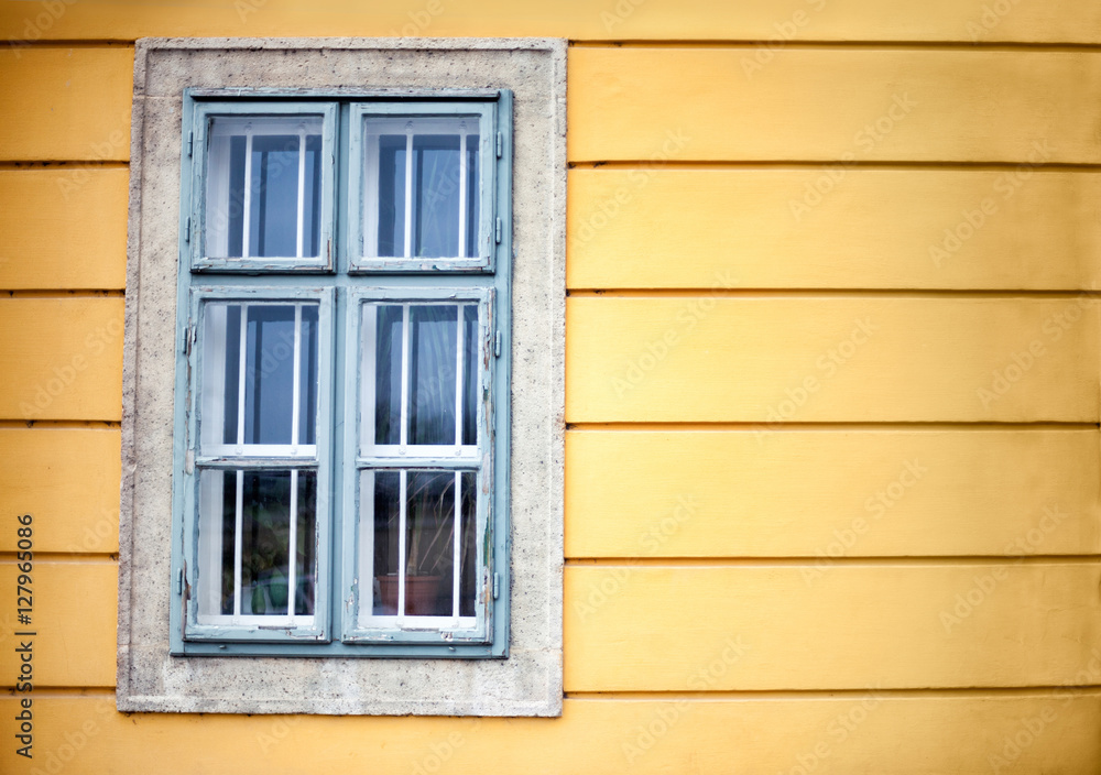 Window On Yellow Wall
