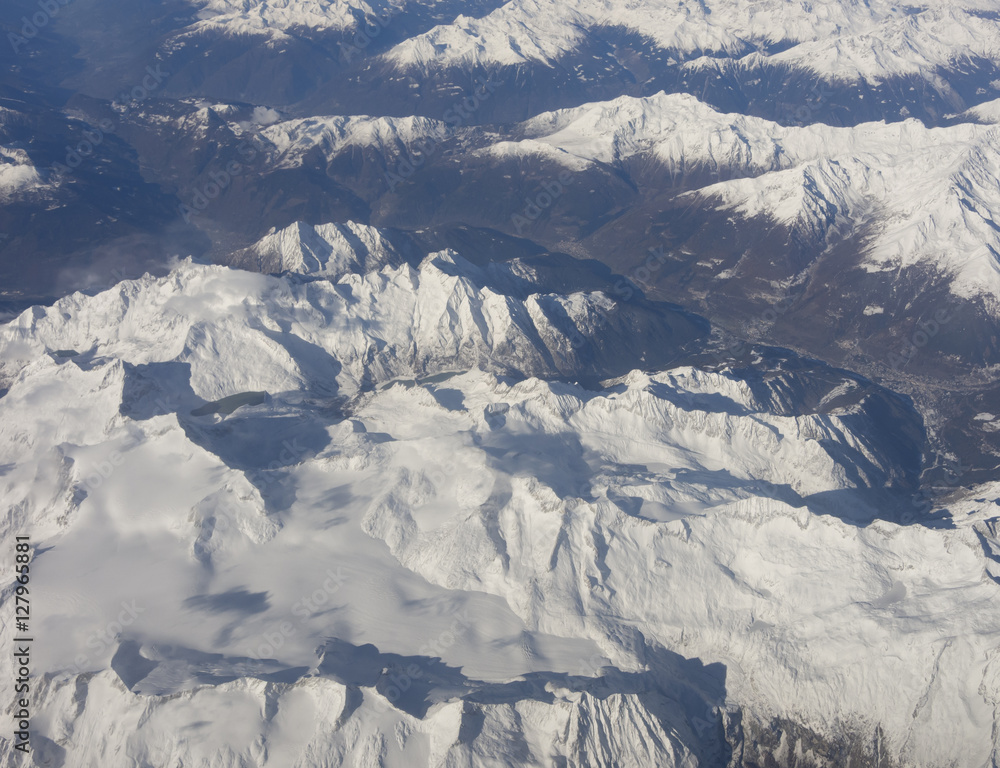 Fototapeta premium Aerial view of the alps in Europe during autumn season with fresh snow. November 2016