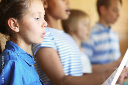 Schoolchildren singing song...