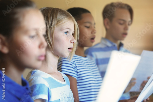 Schoolchildren singing song...