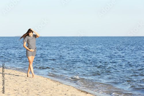 Beautiful pregnant woman in...