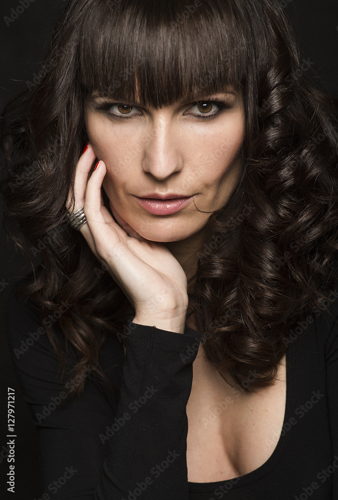 Portrait of a young woman looking at camera Portrait of a young woman looking at camera