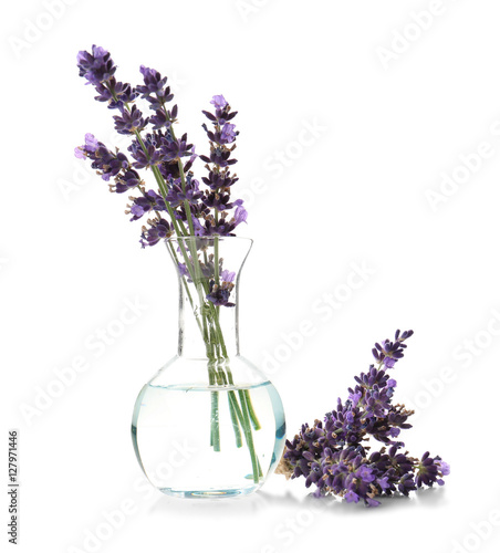 Fototapeta Naklejka Na Ścianę i Meble -  Lavender flowers in glass vase isolated on white