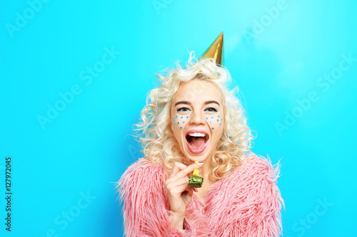 Funny girl in birthday hat ...