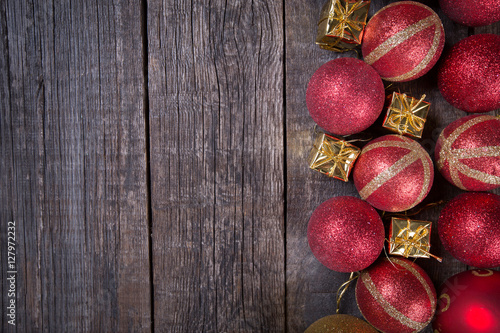 New year balls frame on rustic wooden background