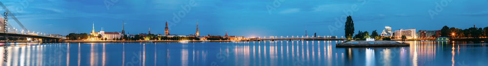 Riga Latvia. Panoramic Urban View Of Daugava, Landmarks In Illumination