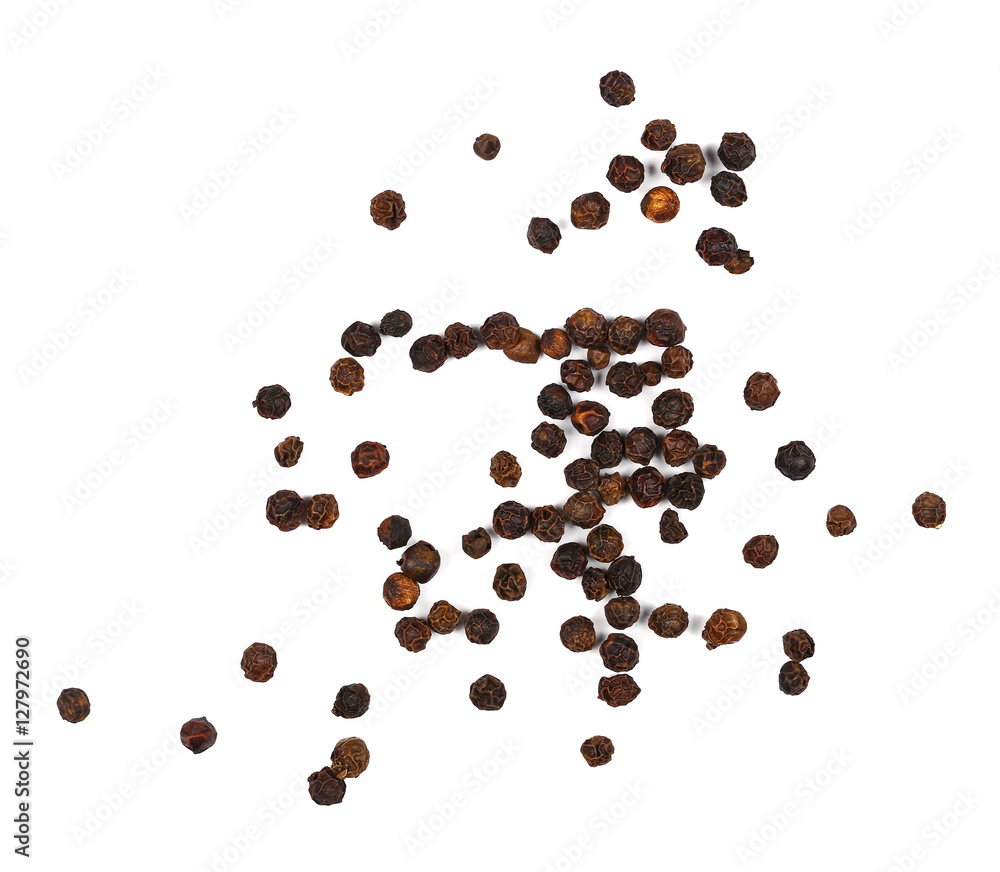 pile peppercorns on white pile peppercorns on white
