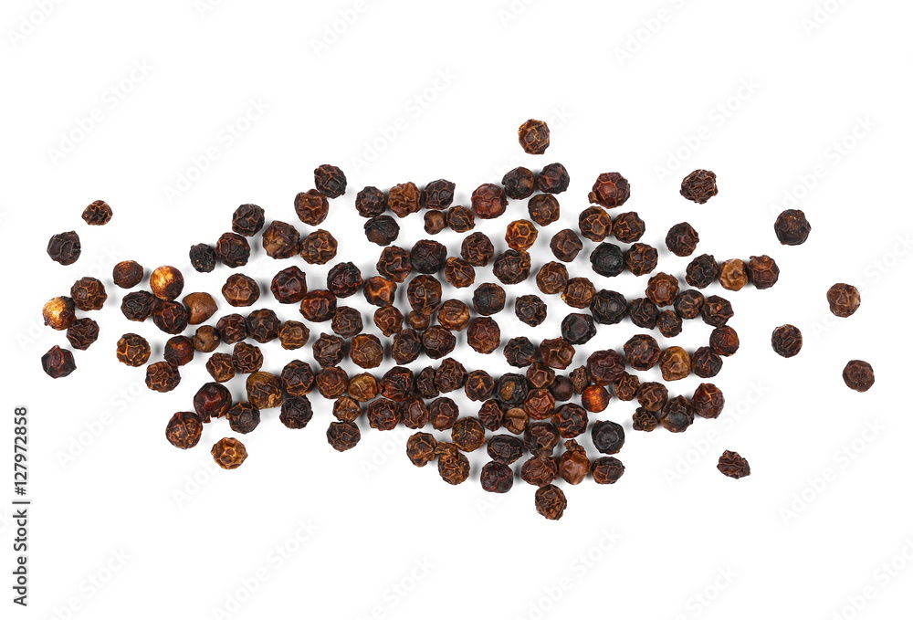 pile peppercorns on white pile peppercorns on white