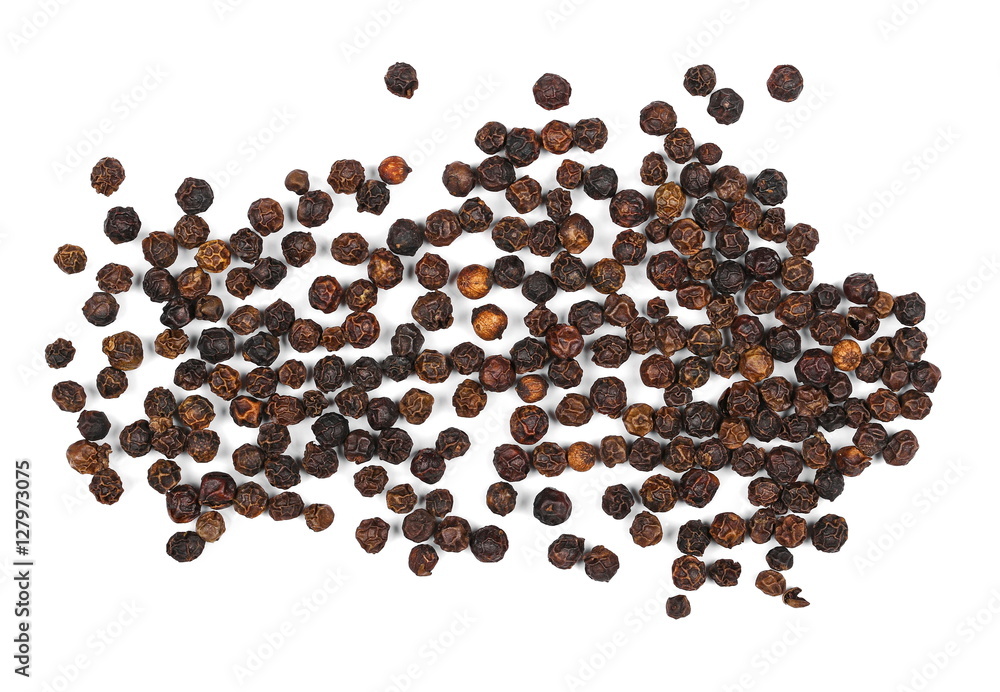 pile peppercorns on white pile peppercorns on white