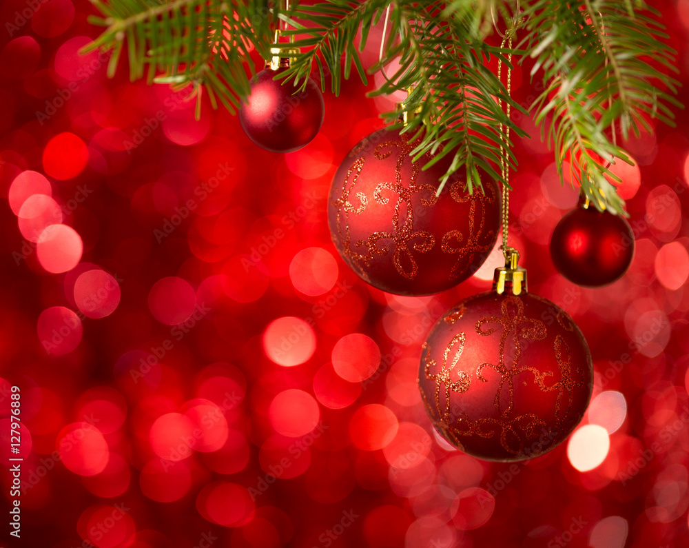 Christmas Baubles on red background with sparkles . Christmas Baubles on red background with sparkles .