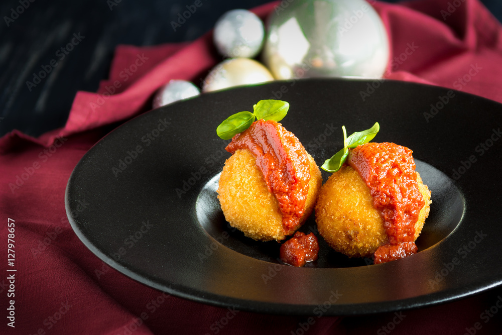 Preview Save to a lightbox Find Similar Images Share Edit Stock Photo: Arancini balls. Fried rice balls festive Christmas Italian rustic black plate dark red background. Snack, Sicilian street foo