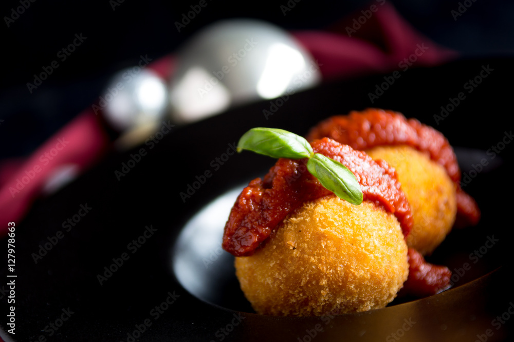 Preview Save to a lightbox Find Similar Images Share Edit Stock Photo: Arancini balls. Fried rice balls festive Christmas Italian rustic black plate dark red background. Snack, Sicilian street foo
