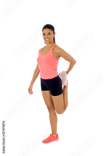 happy beautiful latin woman stretching body muscles doing fitness workout